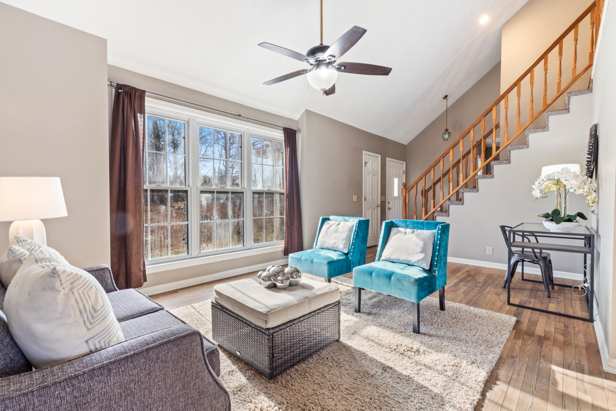 251 Rouse Road Dickson, TN 37055 - Photo 4 of 46 a living room with furniture and a table with wooden floor
