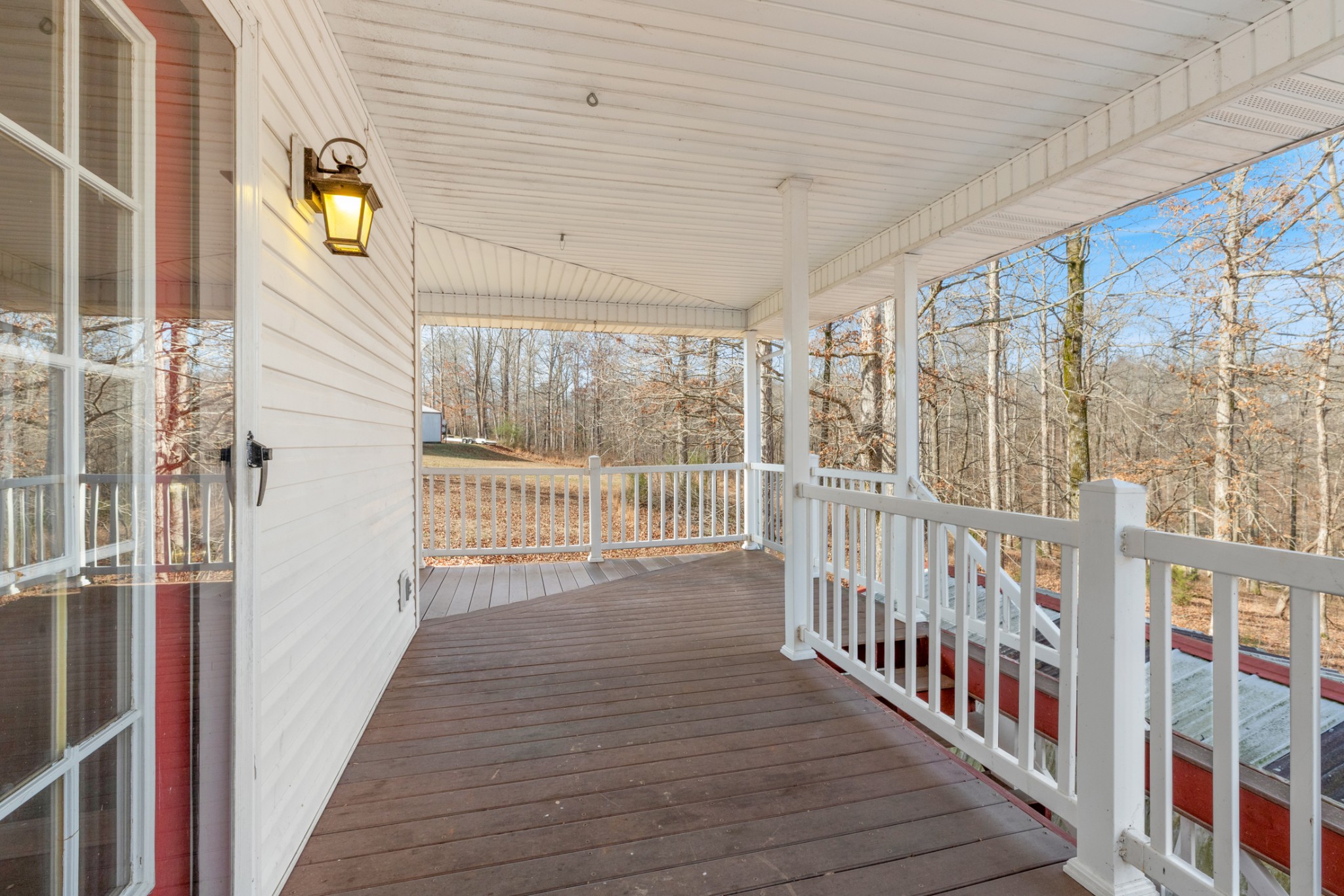 251 Rouse Road Dickson, TN 37055 - Photo 42 of 46 a view of a balcony with wooden floor