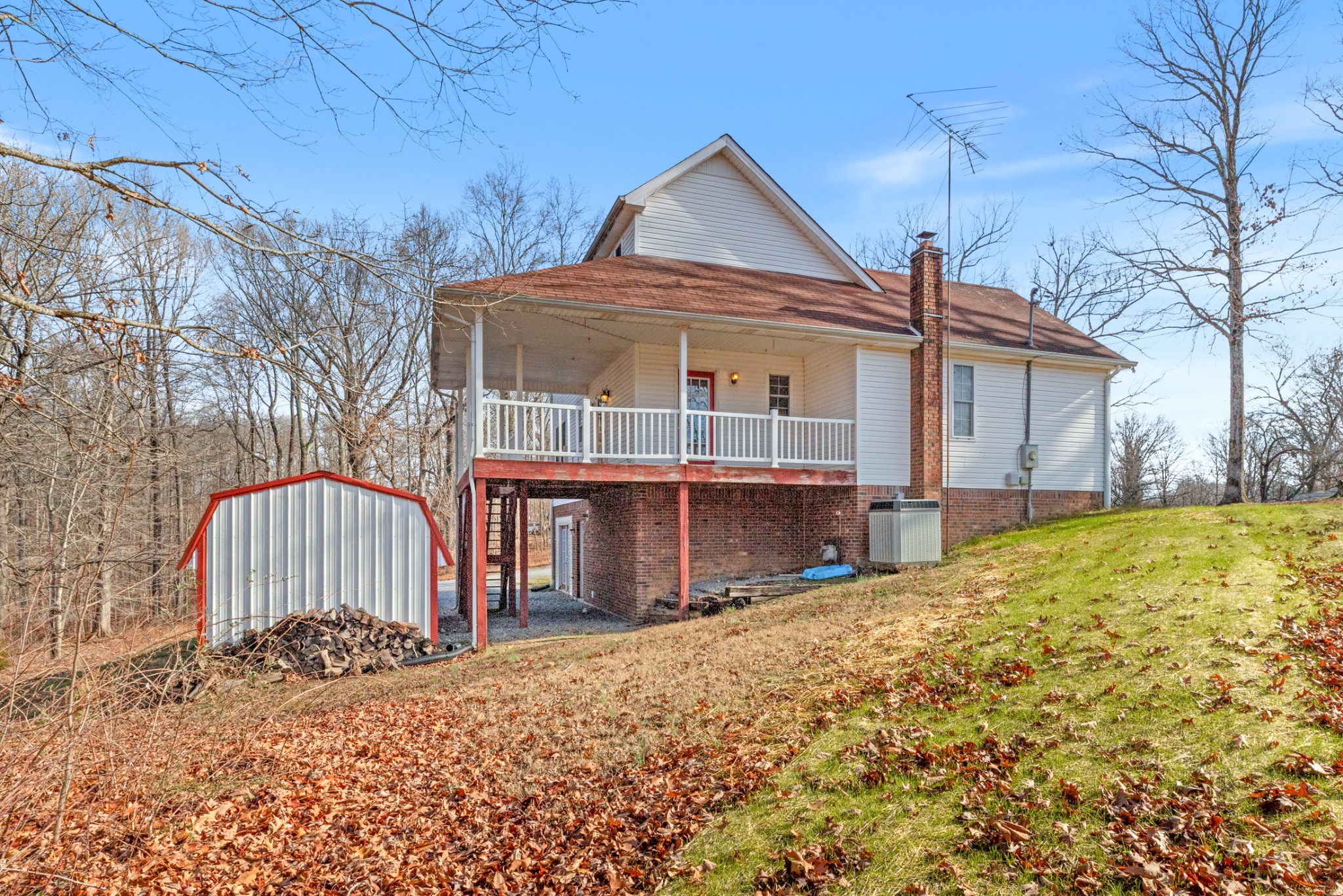 251 Rouse Road Dickson, TN 37055 - Photo 44 of 46 a front view of a house with a yard