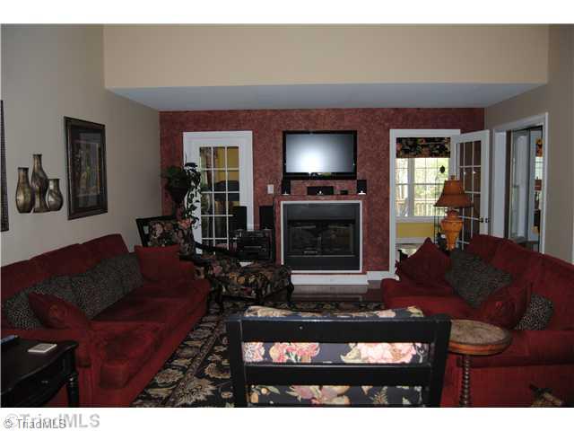3200 Old Mountain Road Trinity, NC 27370 - Photo 3 of 16 Living Room. check out the double sided fireplace and the spacious livingroom