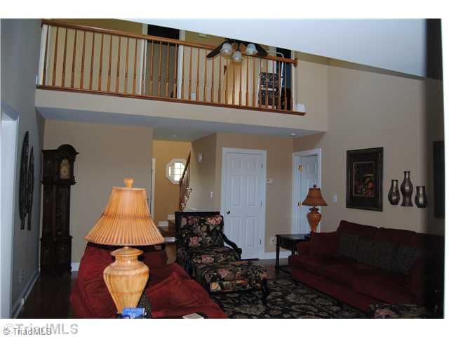 3200 Old Mountain Road Trinity, NC 27370 - Photo 4 of 16 Living Room. another view of the livingroom showing the cat walk upstairs