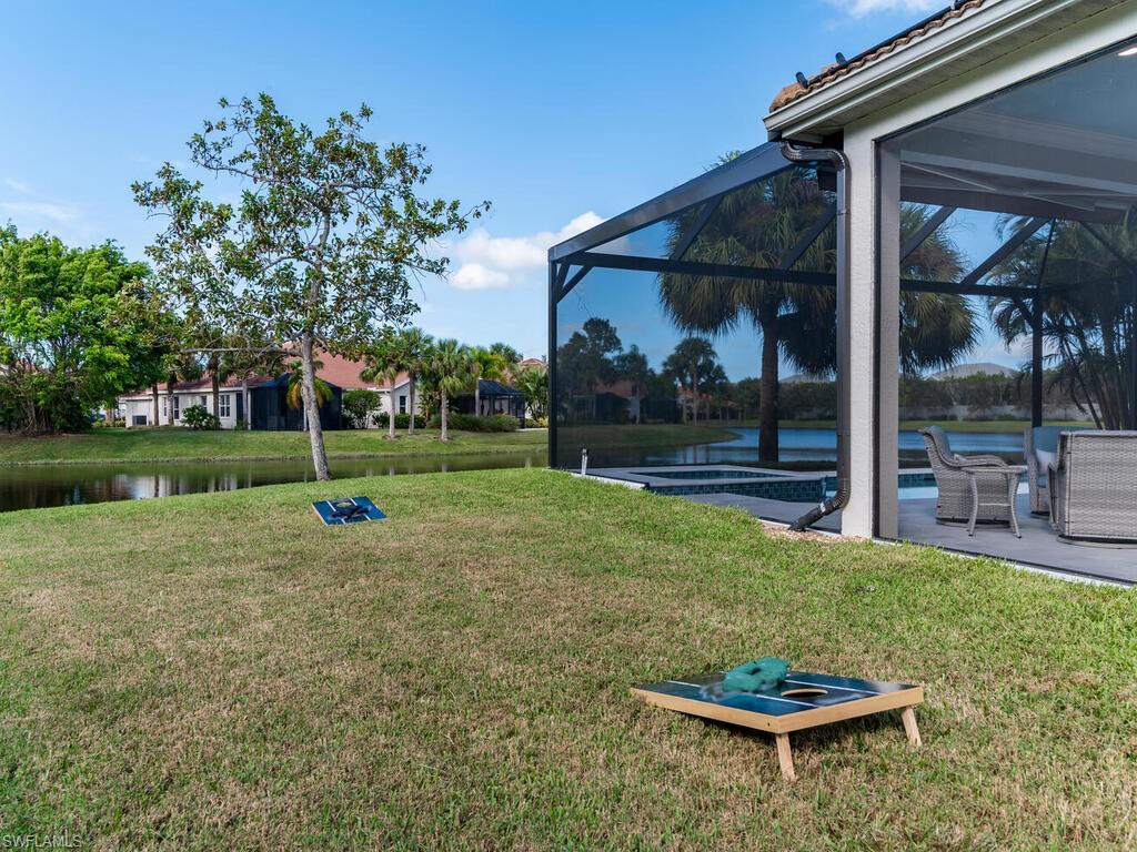 8541 Peppertree Way Naples, FL 34114 - Photo 23 of 36 Room for games in the side yard