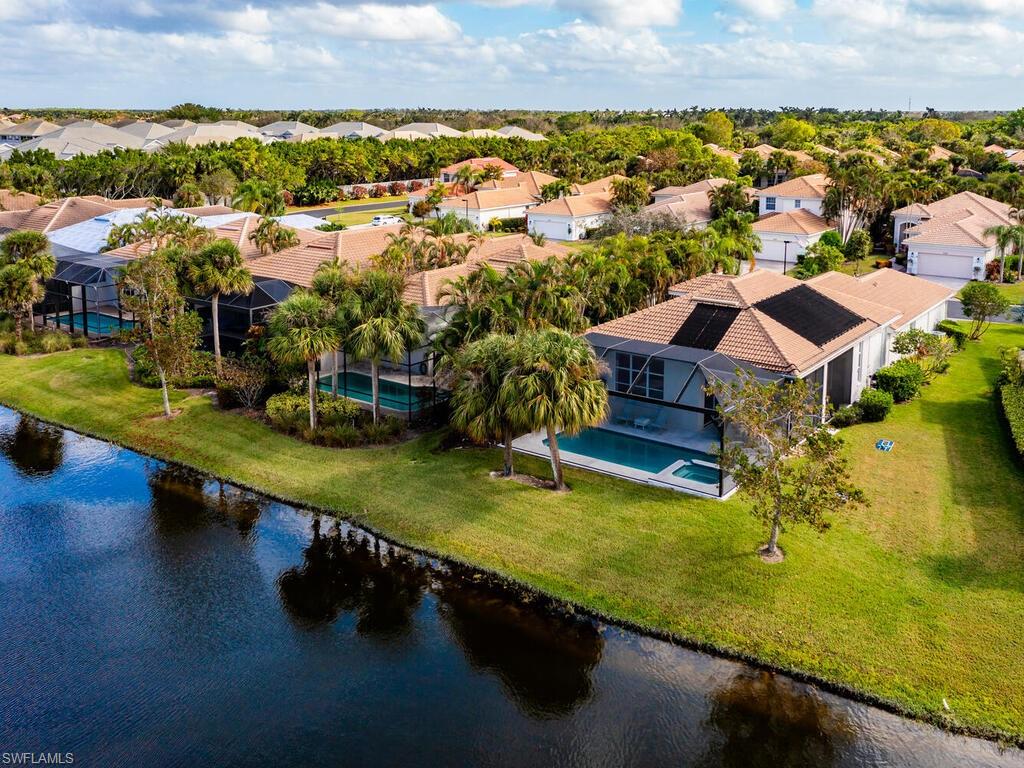 8541 Peppertree Way Naples, FL 34114 - Photo 27 of 36 Bird's eye view featuring a water view