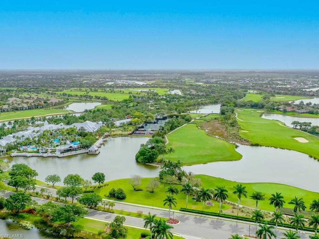 8541 Peppertree Way Naples, FL 34114 - Photo 33 of 36 Drone / aerial showing clubhouse and golf course
