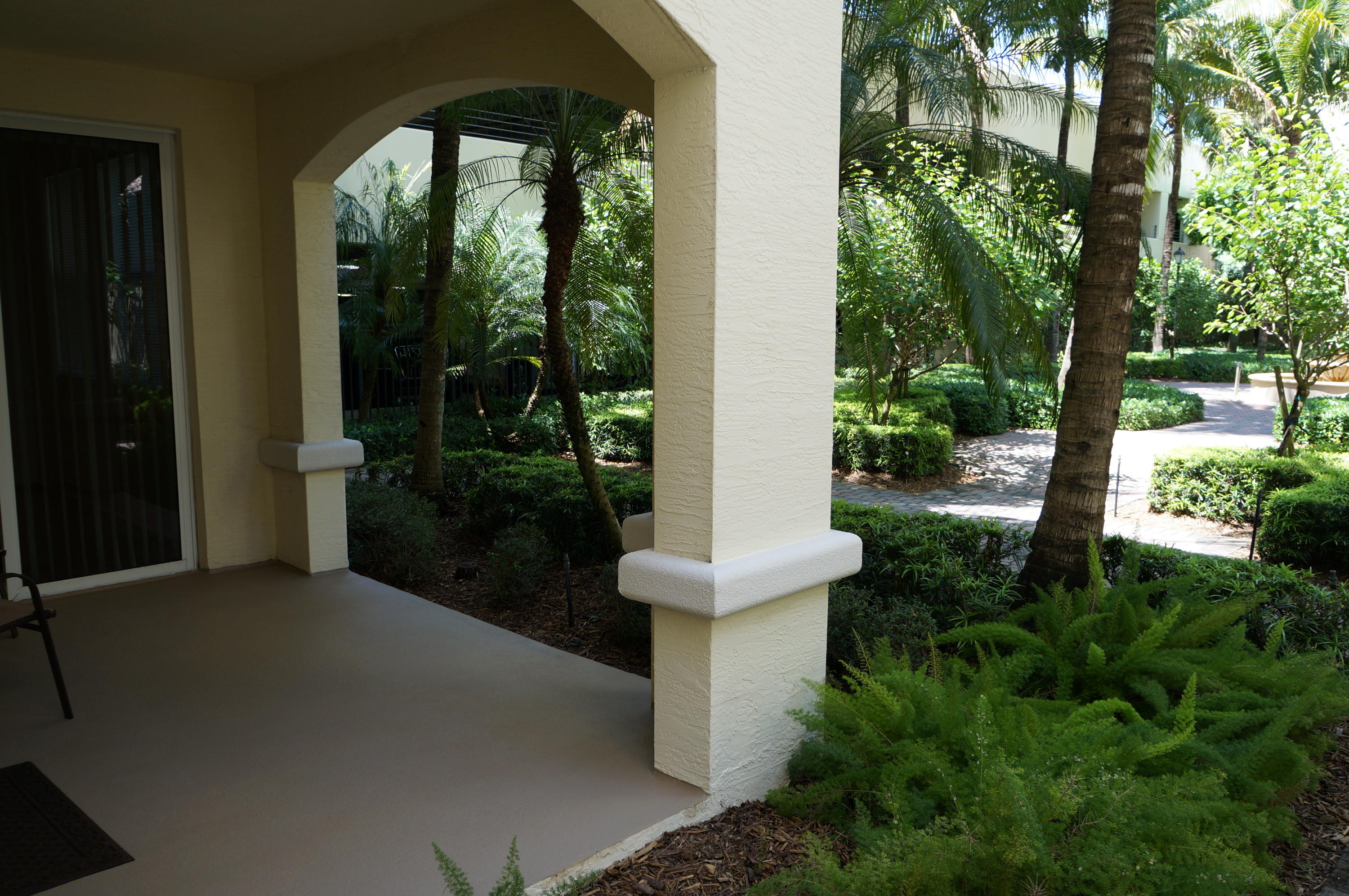 1121 Renaissance Way, Unit 121 Boynton Beach, FL 33426 - Photo 12 of 28 a view of a garden with plants