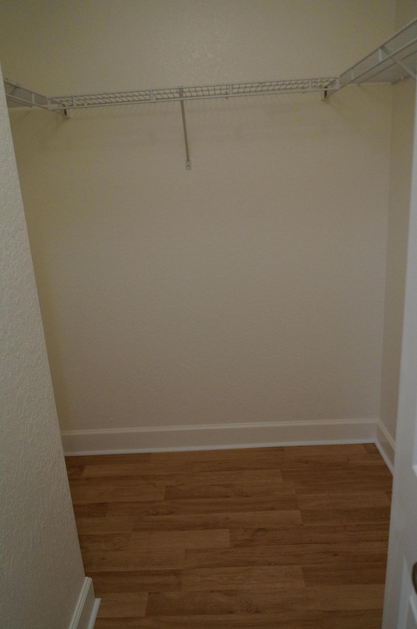 1121 Renaissance Way, Unit 121 Boynton Beach, FL 33426 - Photo 20 of 28 a view of an empty walk in closet