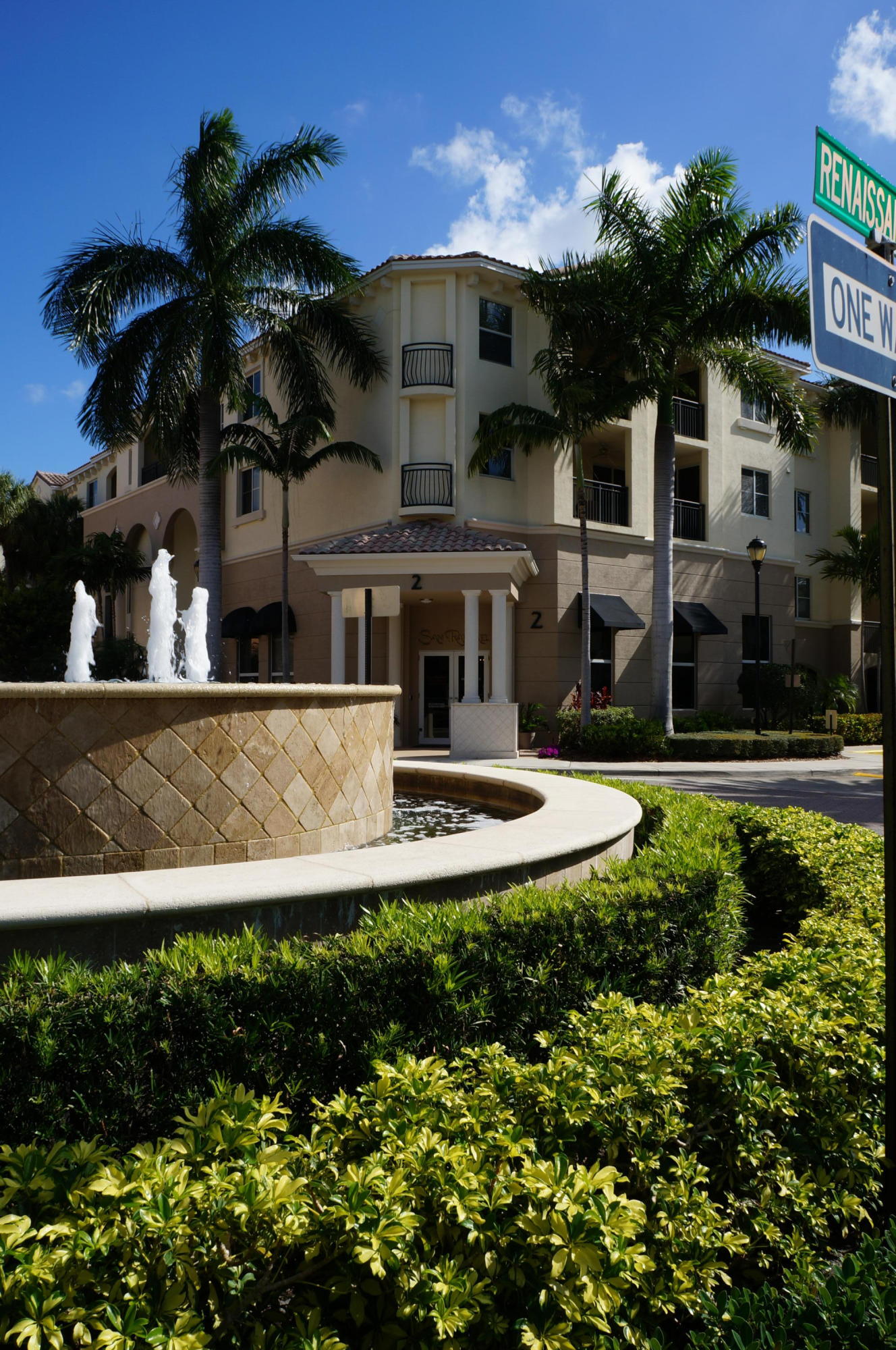 1121 Renaissance Way, Unit 121 Boynton Beach, FL 33426 - Photo 25 of 28 front view of a house with a small yard