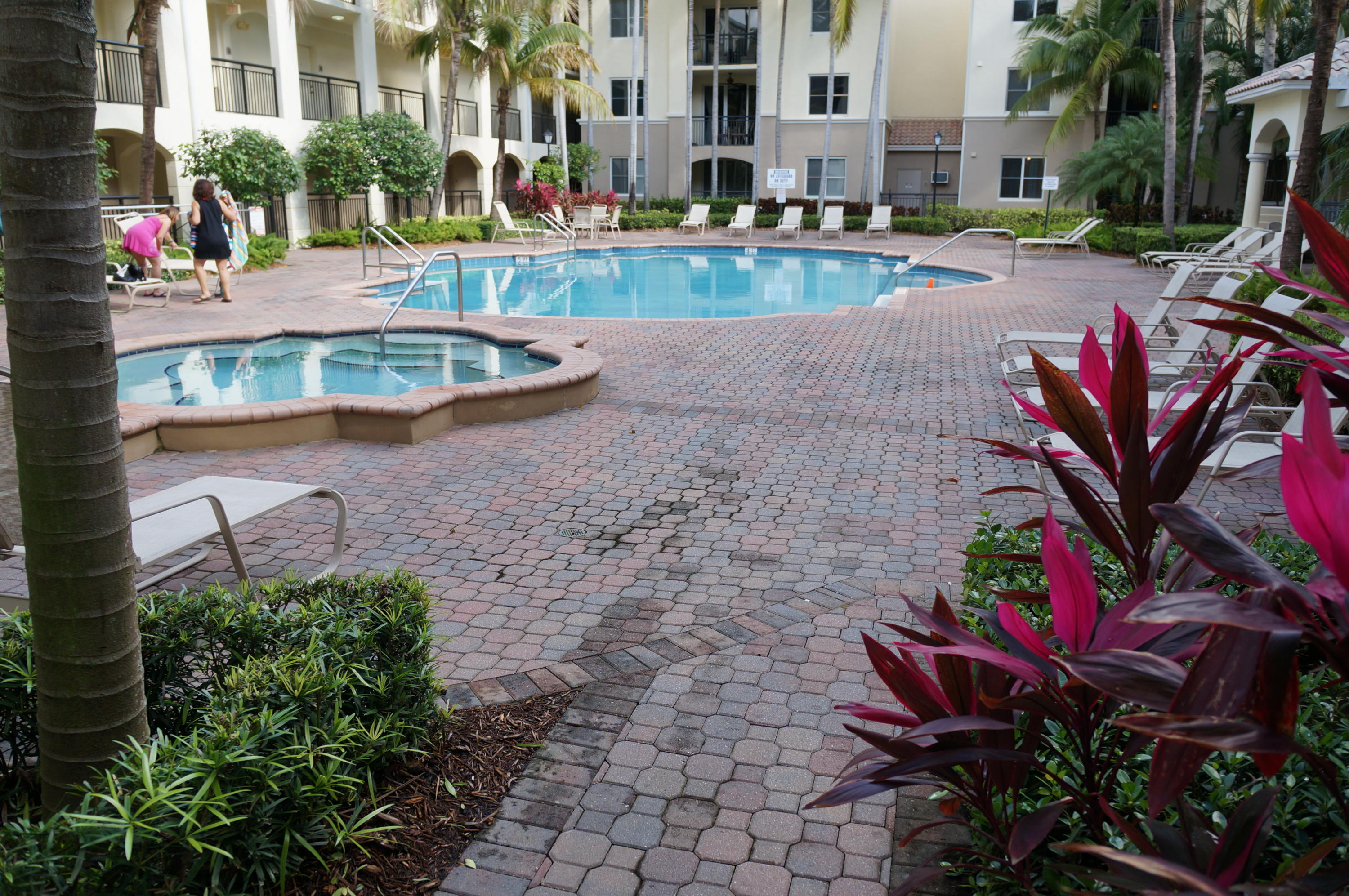 1121 Renaissance Way, Unit 121 Boynton Beach, FL 33426 - Photo 28 of 28 a view of a swimming pool with sitting area