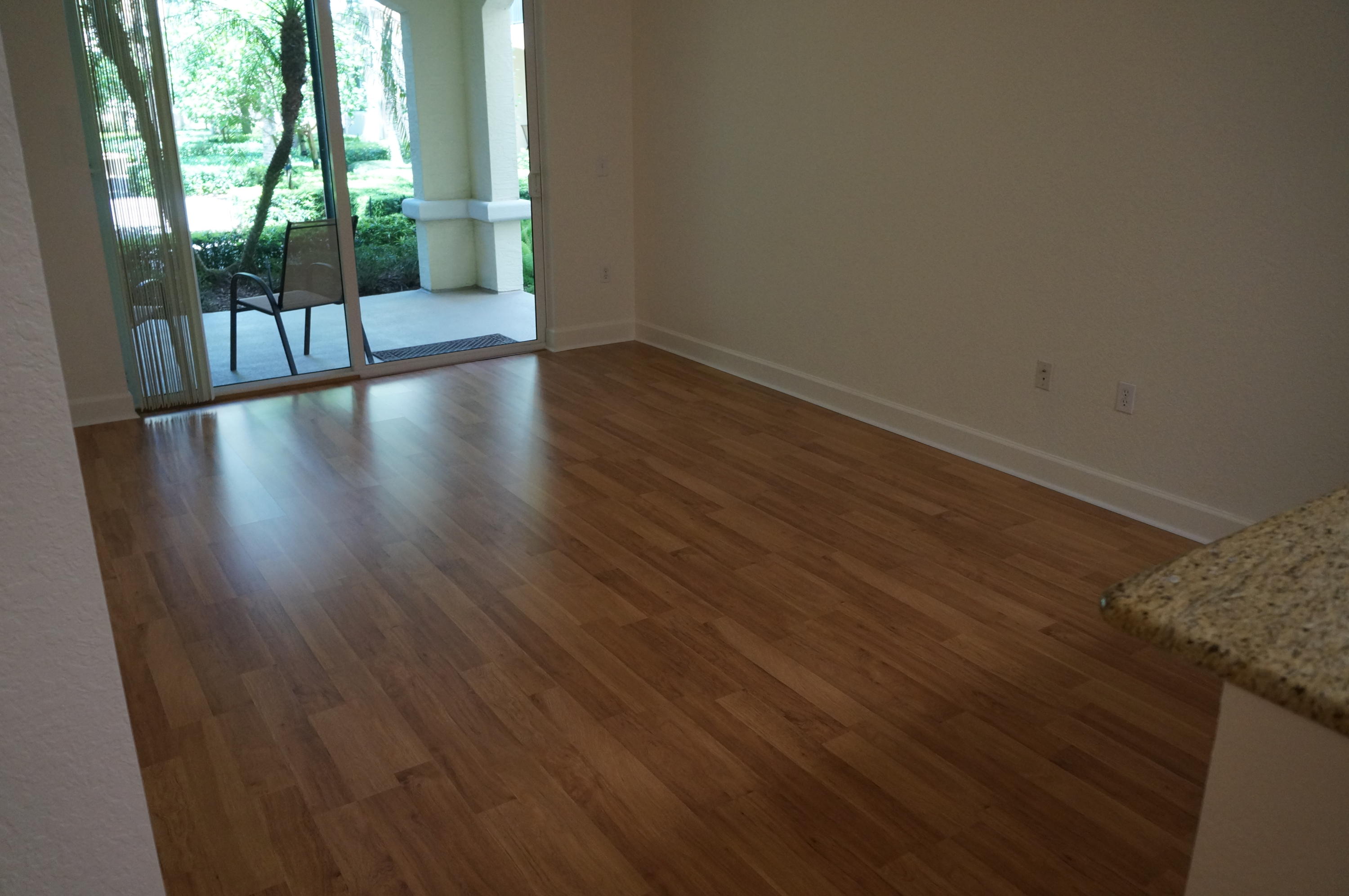 1121 Renaissance Way, Unit 121 Boynton Beach, FL 33426 - Photo 4 of 28 a view of entryway with wooden floor