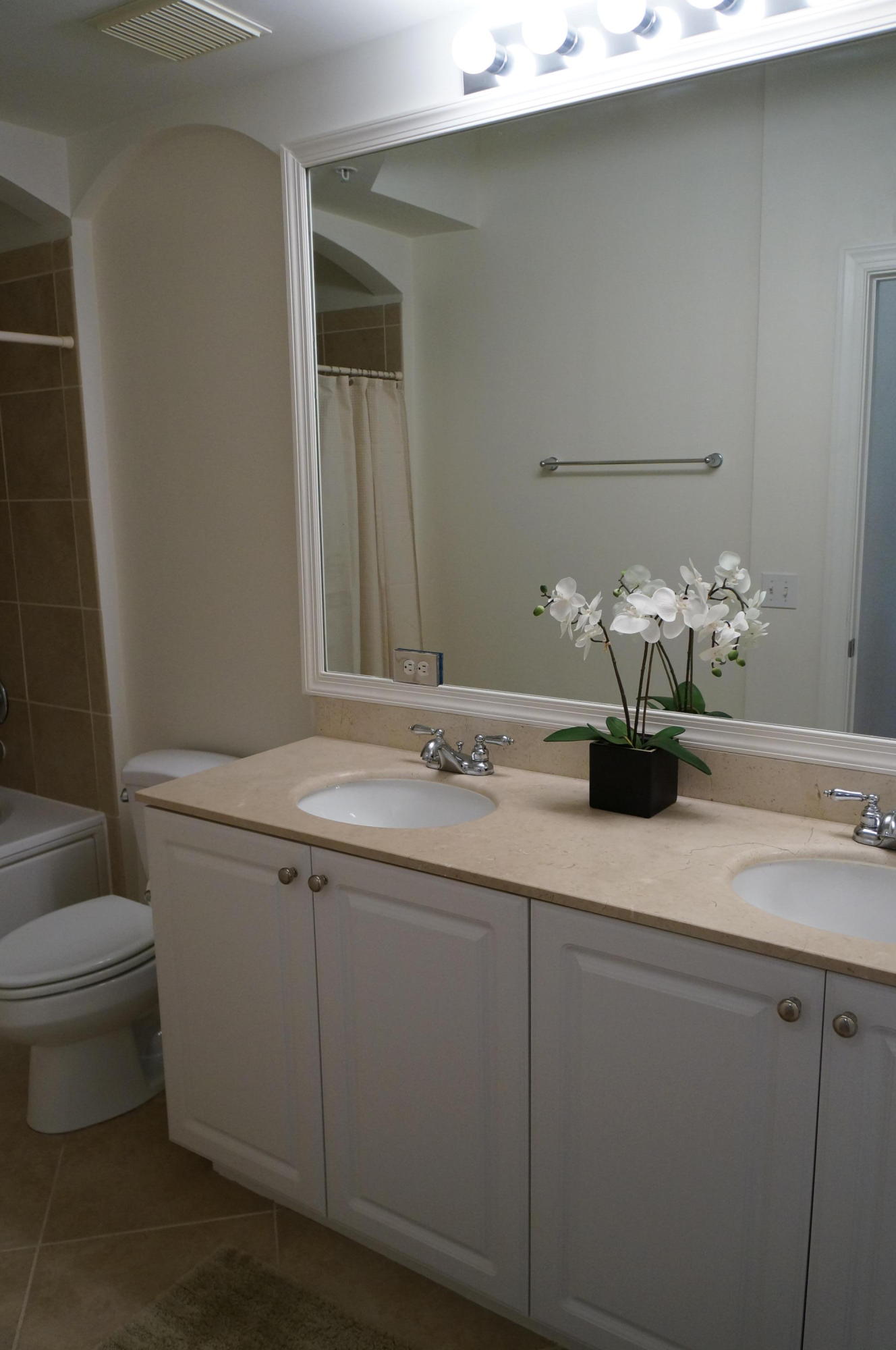 1121 Renaissance Way, Unit 121 Boynton Beach, FL 33426 - Photo 8 of 28 a bathroom with a sink and a toilet