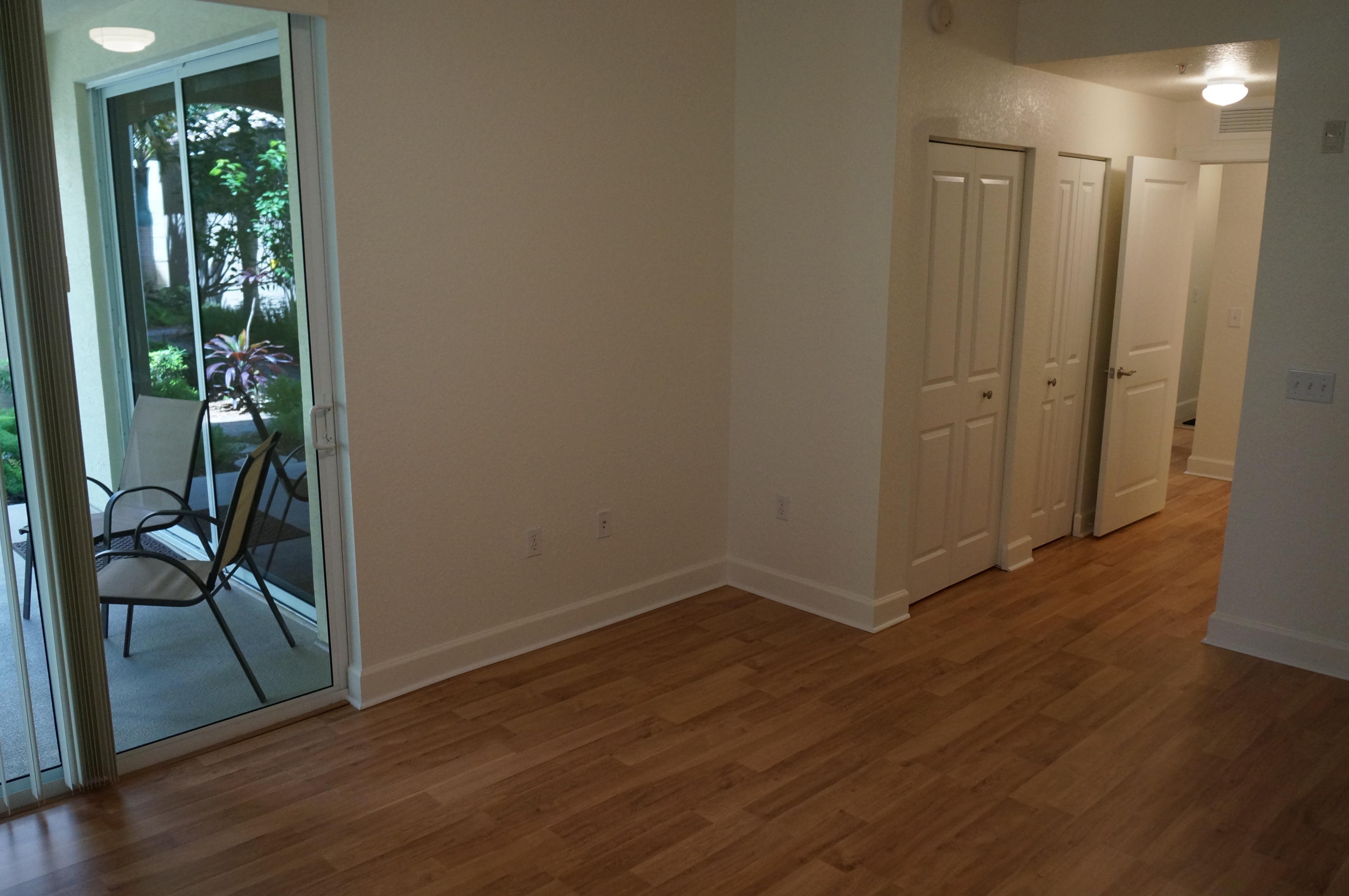 1121 Renaissance Way, Unit 121 Boynton Beach, FL 33426 - Photo 10 of 28 a view of a hallway with wooden floor