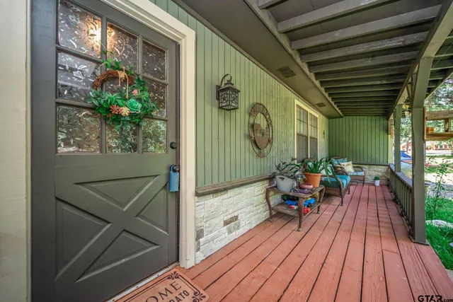 a view of balcony with chairs
