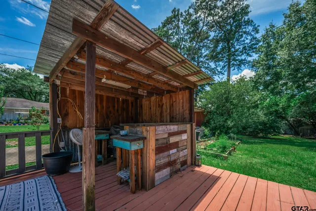 a view of a backyard with a garden