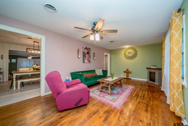 a living room with furniture and a table