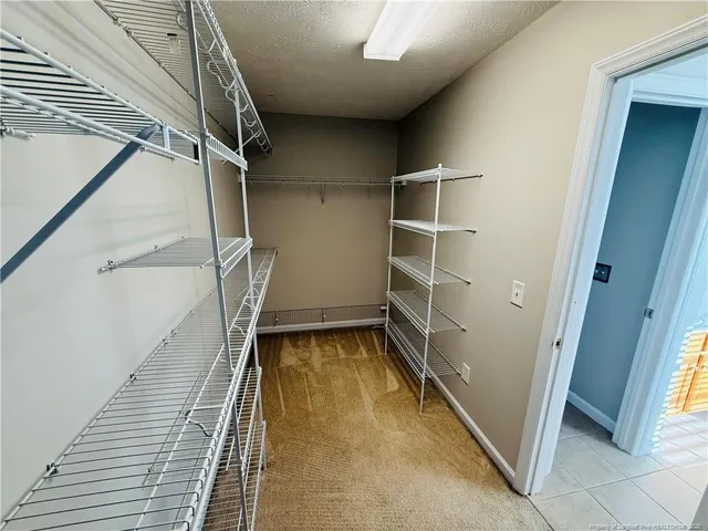 a en suite bathroom with a sink and mirror