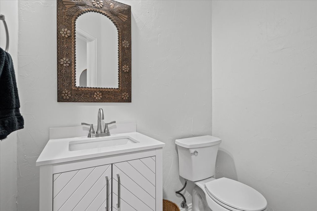 37 Pillow Road Austin, TX 78745 - Photo 15 of 18 A well-lit half bathroom offers a sleek vanity with modern hardware.