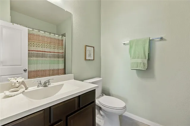 a bathroom with a sink and a toilet