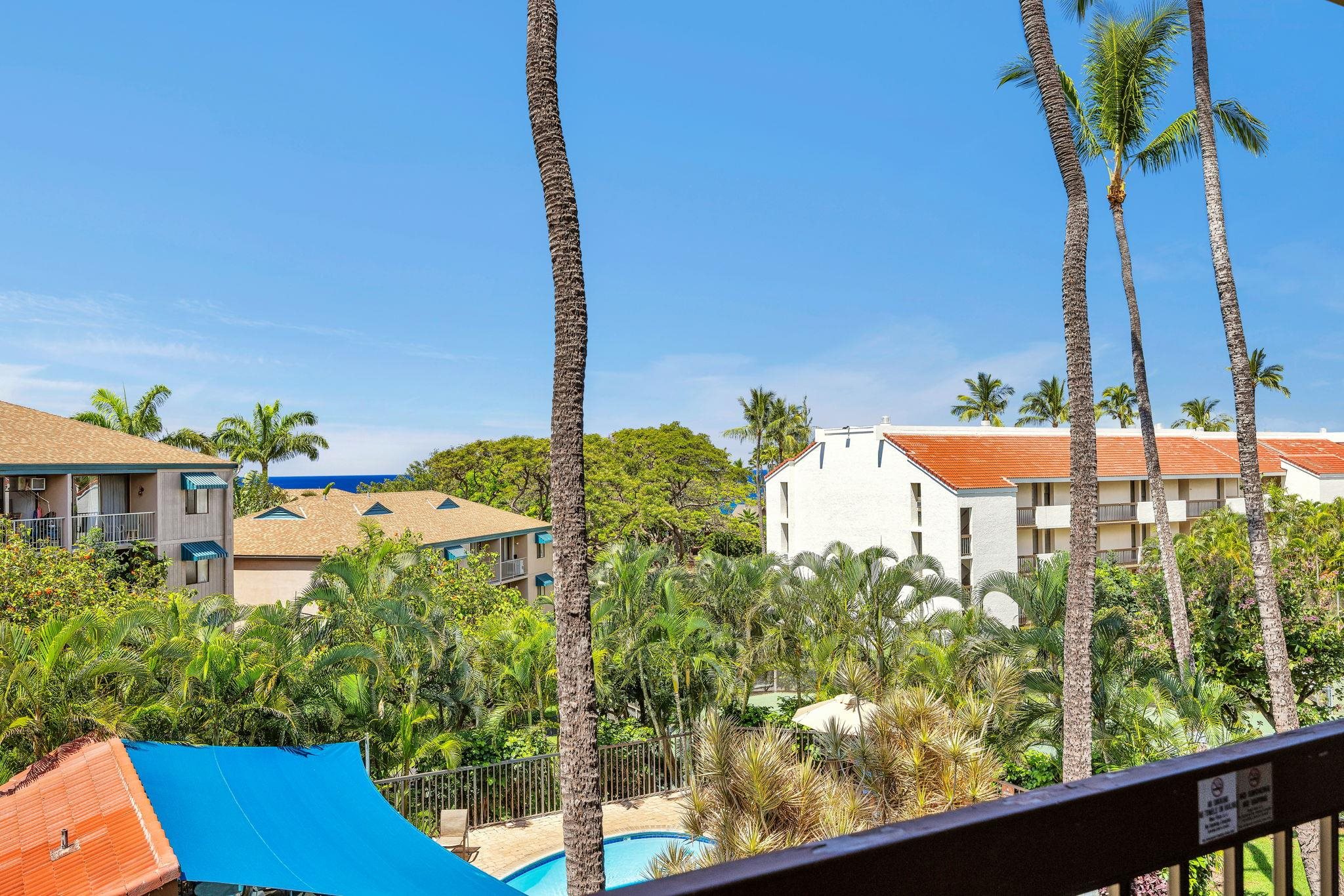 2191 South Kihei Road, Unit 2306 Kihei, HI 96753 - Photo 24 of 41 a view of a balcony with an outdoor space and seating area