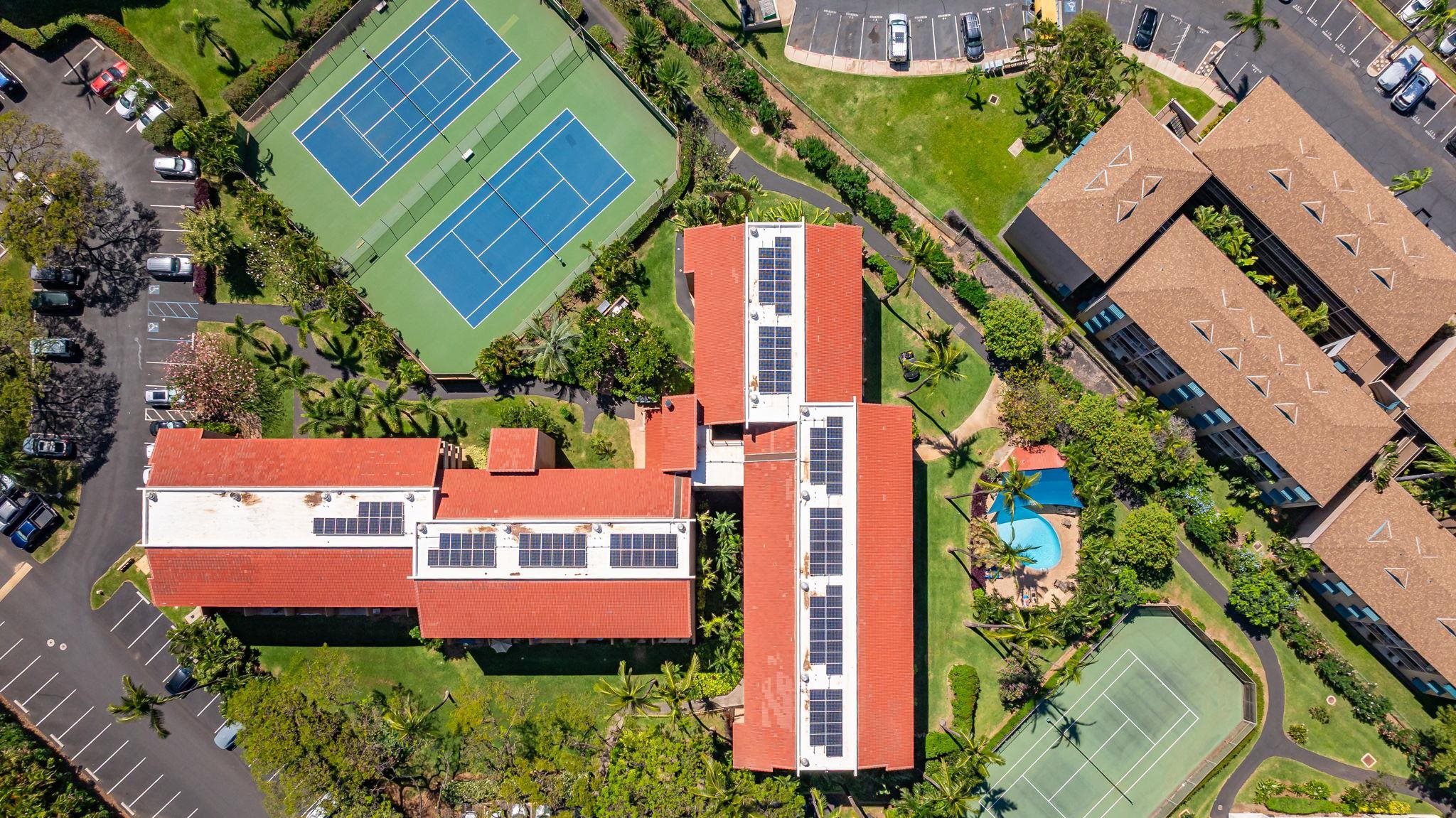 2191 South Kihei Road, Unit 2306 Kihei, HI 96753 - Photo 37 of 41 an aerial view of multiple houses with yard