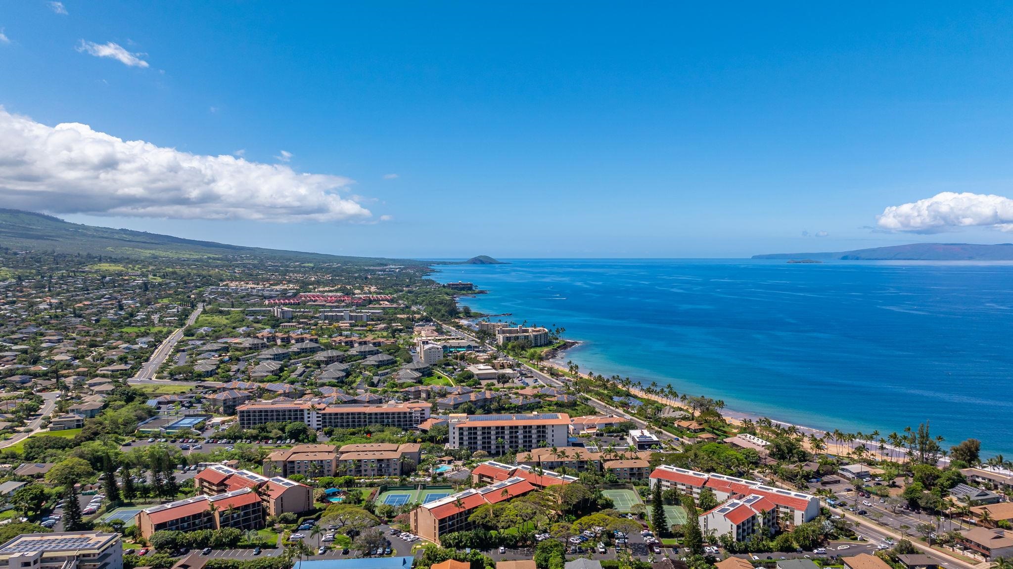 2191 South Kihei Road, Unit 2306 Kihei, HI 96753 - Photo 40 of 41 an aerial view of a city with lots of residential buildings