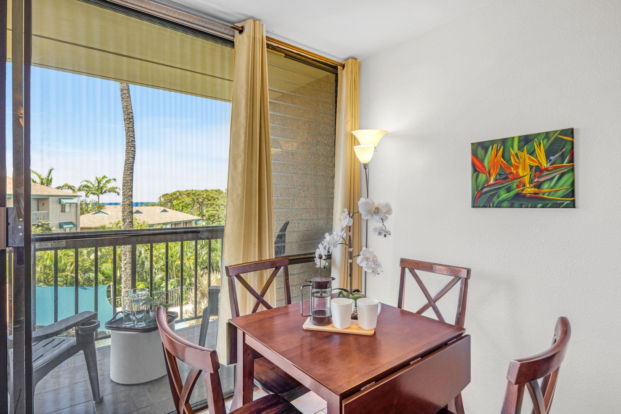 2191 South Kihei Road, Unit 2306 Kihei, HI 96753 - Photo 6 of 41 a view of a dining room with furniture window and outside view