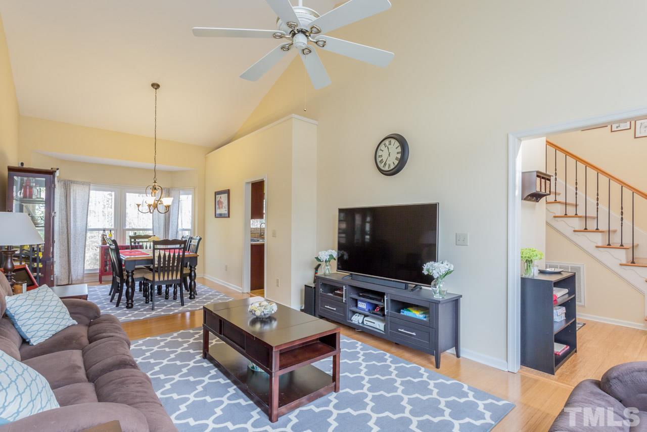 4305 Birmingham Way Raleigh, NC 27604 - Photo 12 of 23 a living room with furniture and a flat screen tv