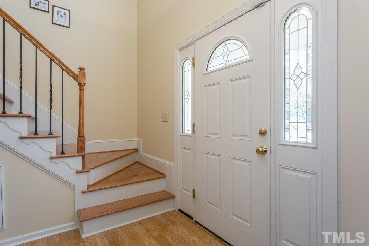 4305 Birmingham Way Raleigh, NC 27604 - Photo 14 of 23 a view of an entryway with wooden floor