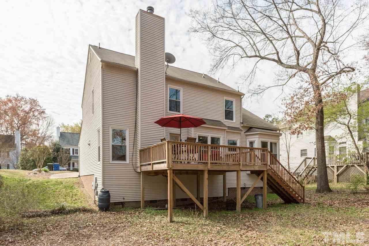 4305 Birmingham Way Raleigh, NC 27604 - Photo 23 of 23 a view of a house with a yard and furniture