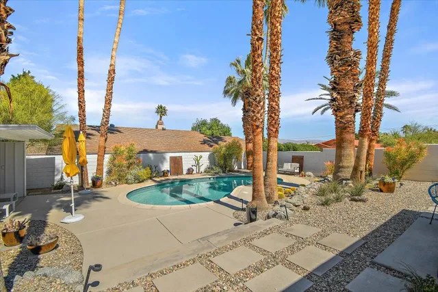 a view of a backyard with a patio