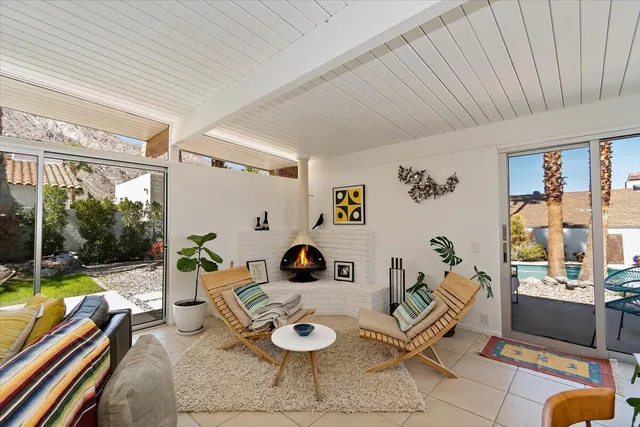 a living room with furniture and a table