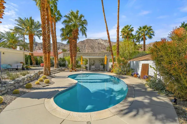 a view of a house with swimming pool