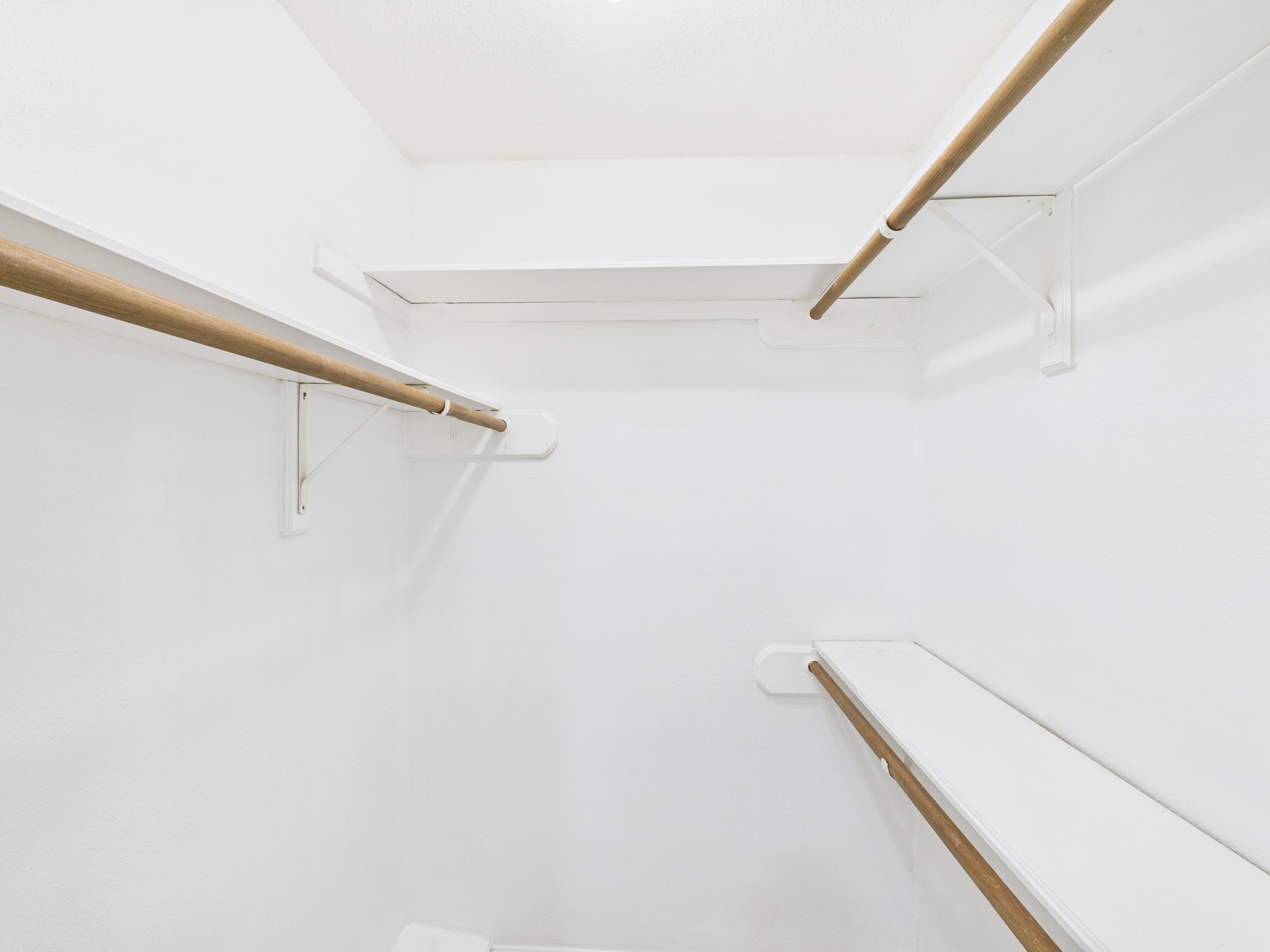 7610 Hopewell Lane Houston, TX 77071 - Photo 17 of 31 a view of small space with racks on the wall