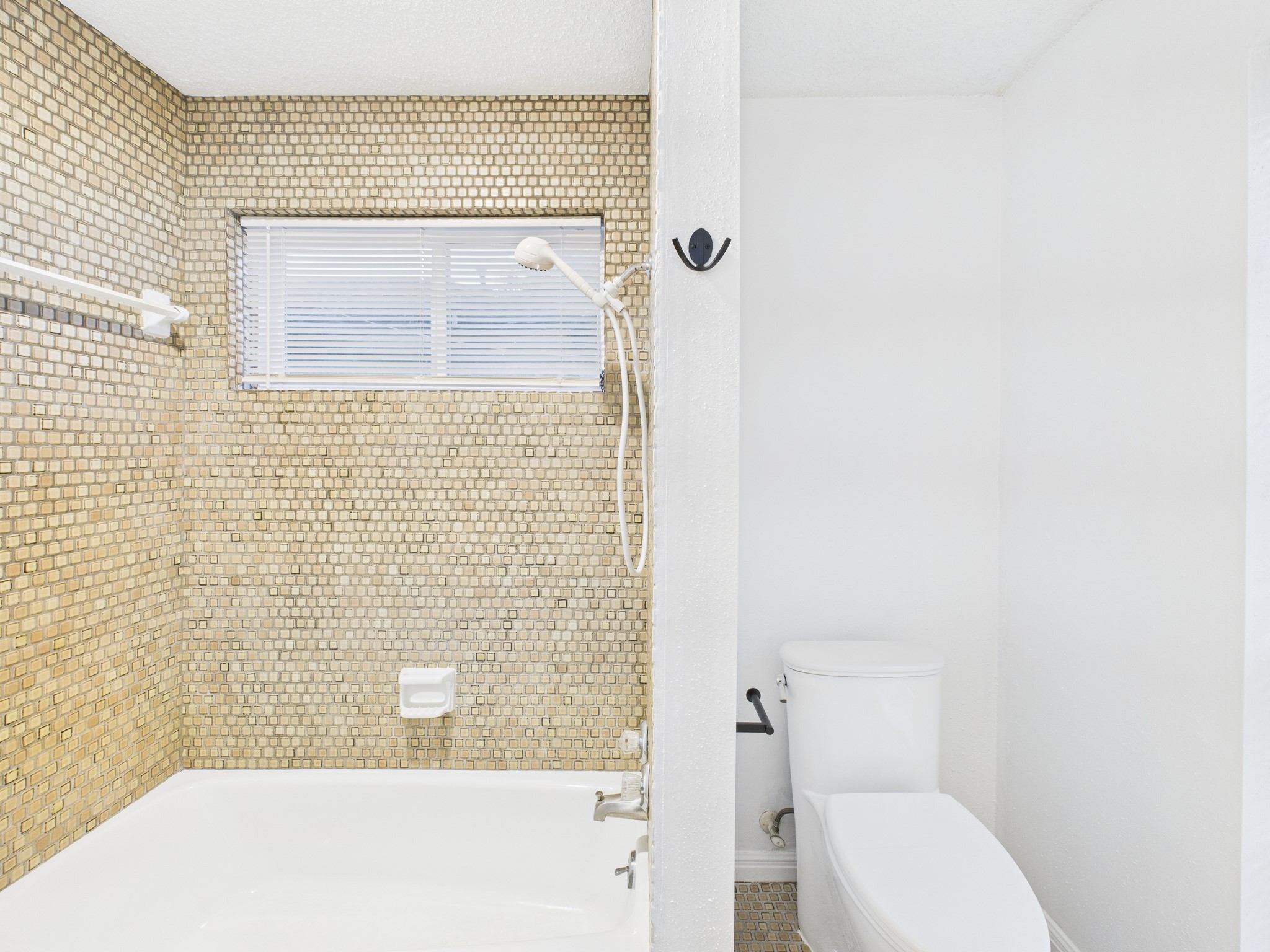 7610 Hopewell Lane Houston, TX 77071 - Photo 20 of 31 a bathroom with a toilet and a shower
