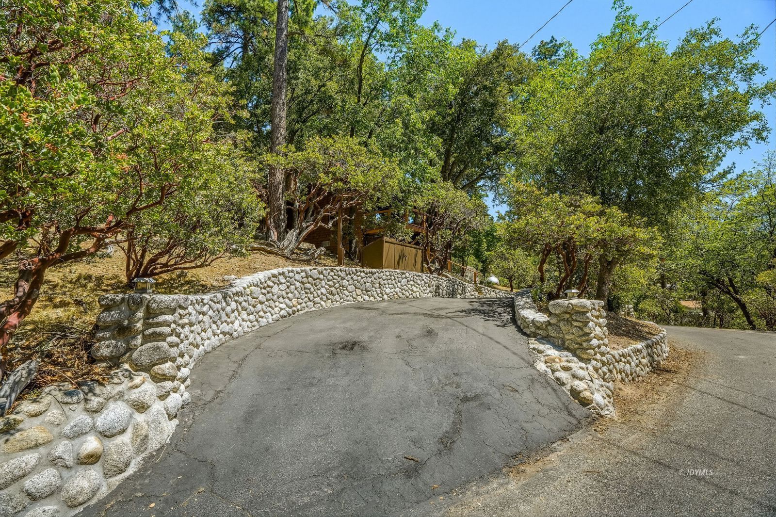 24945 Marion Ridge Drive Idyllwild, CA 92549 - Photo 43 of 53 Circular driveway w/custom rock walls