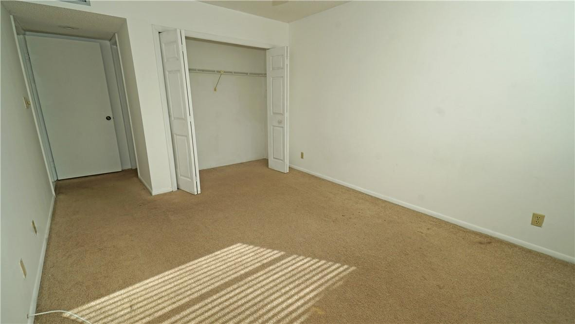 16400 Golf Club Road, Unit 305 Weston, FL 33326 - Photo 13 of 24 an empty room with closet