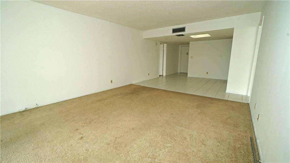 16400 Golf Club Road, Unit 305 Weston, FL 33326 - Photo 5 of 24 an empty room