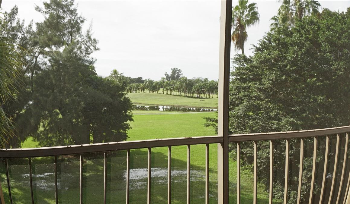 16400 Golf Club Road, Unit 305 Weston, FL 33326 - Photo 6 of 24 a view of a balcony with an outdoor space