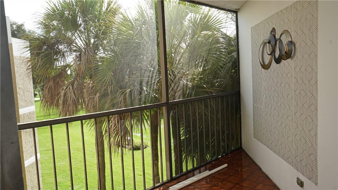 16400 Golf Club Road, Unit 305 Weston, FL 33326 - Photo 7 of 24 a view of a balcony