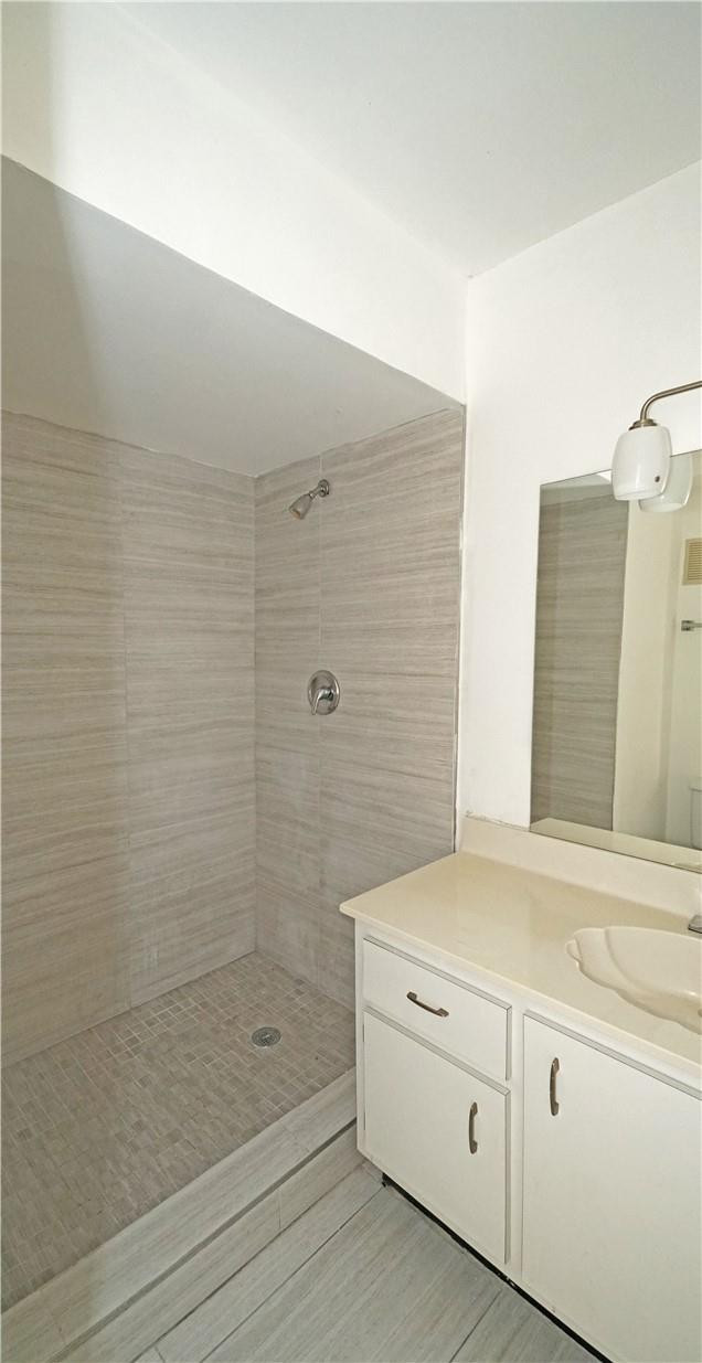 16400 Golf Club Road, Unit 305 Weston, FL 33326 - Photo 10 of 24 a bathroom with a shower and a sink