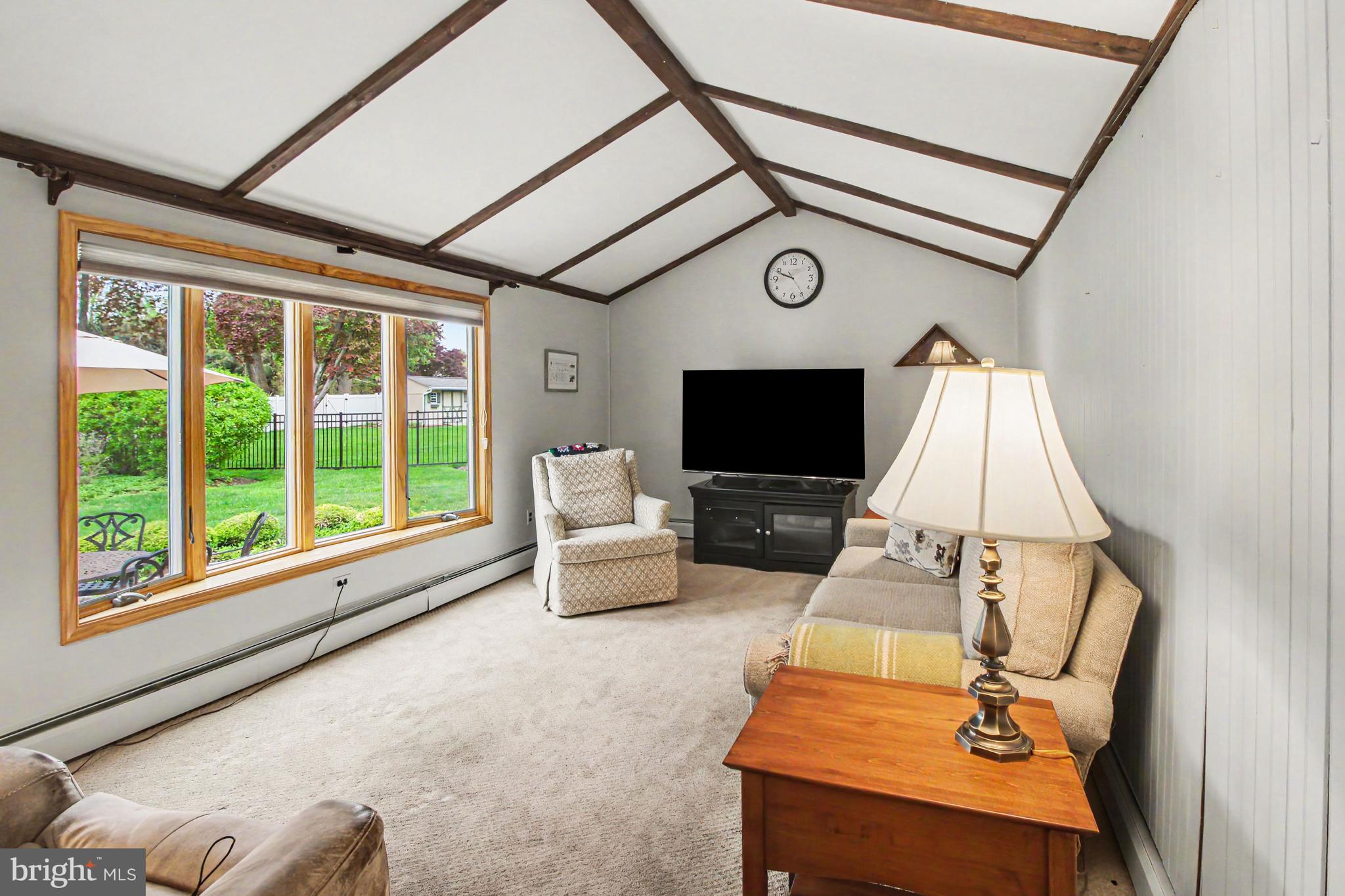 917 Cedar Grove Road Broomall, PA 19008 - Photo 12 of 33 a living room with furniture and a flat screen tv