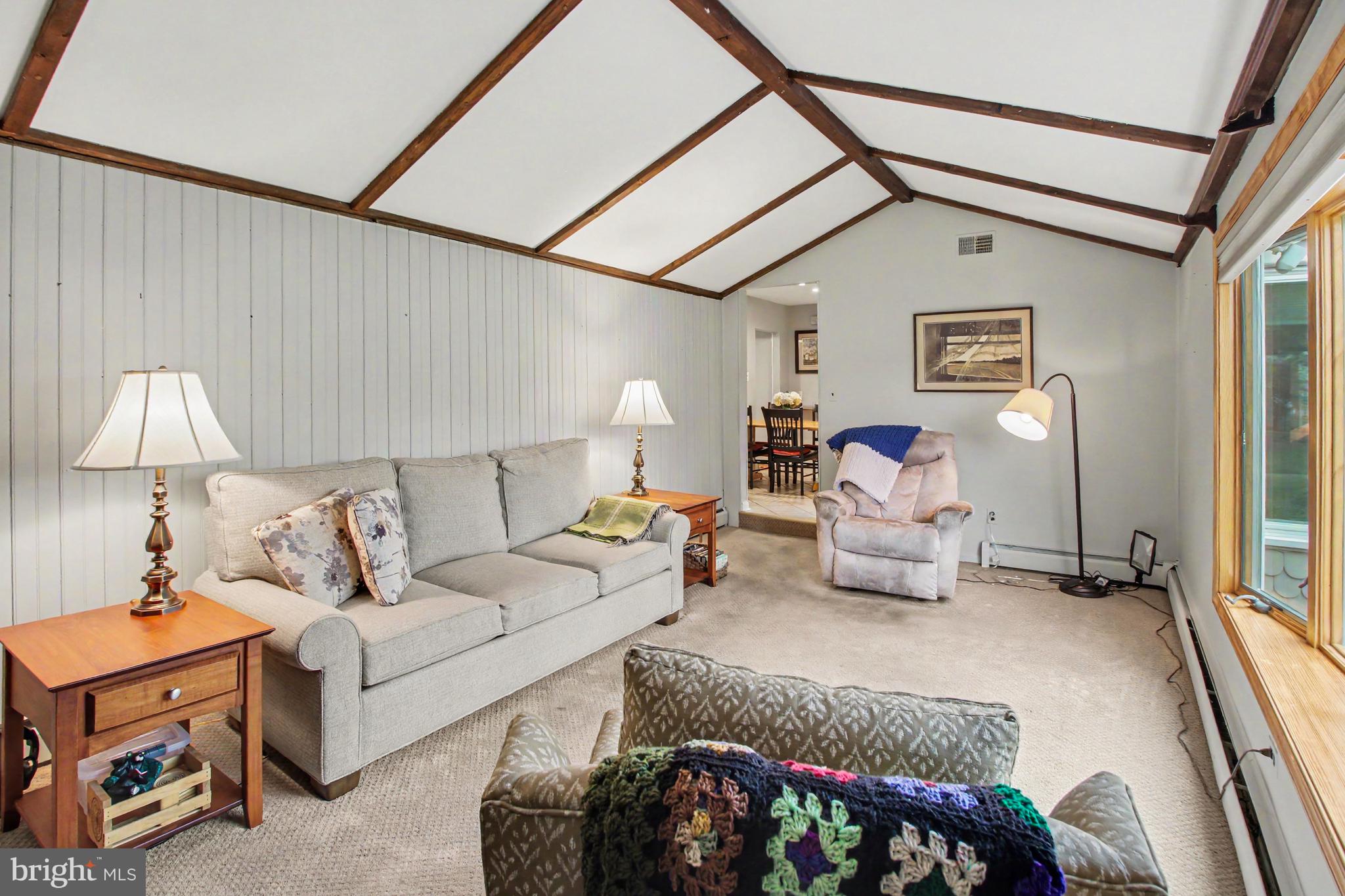 917 Cedar Grove Road Broomall, PA 19008 - Photo 13 of 33 a bed room with a bed and a lamp