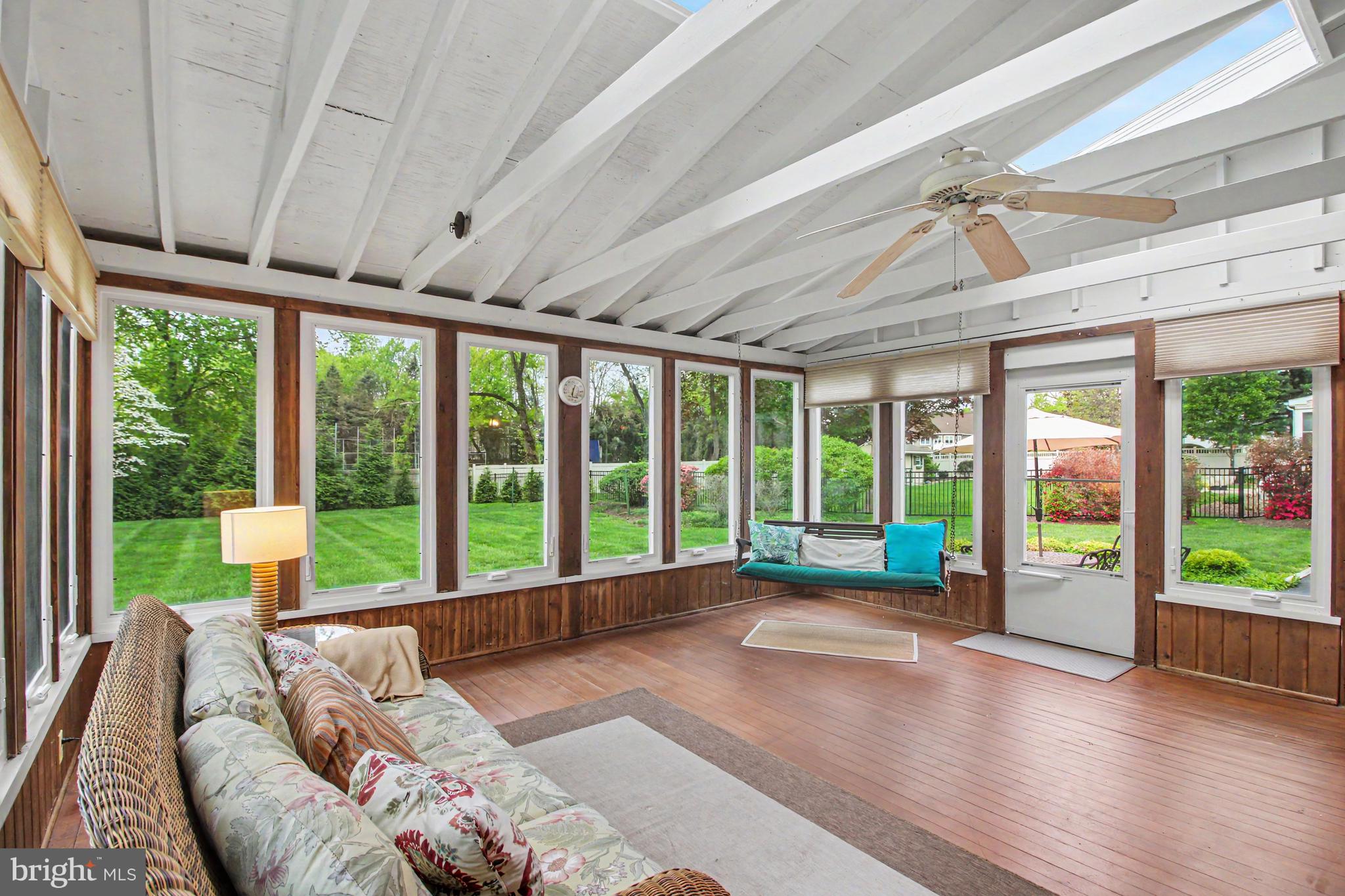 917 Cedar Grove Road Broomall, PA 19008 - Photo 15 of 33 a view of a porch with furniture and a backyard