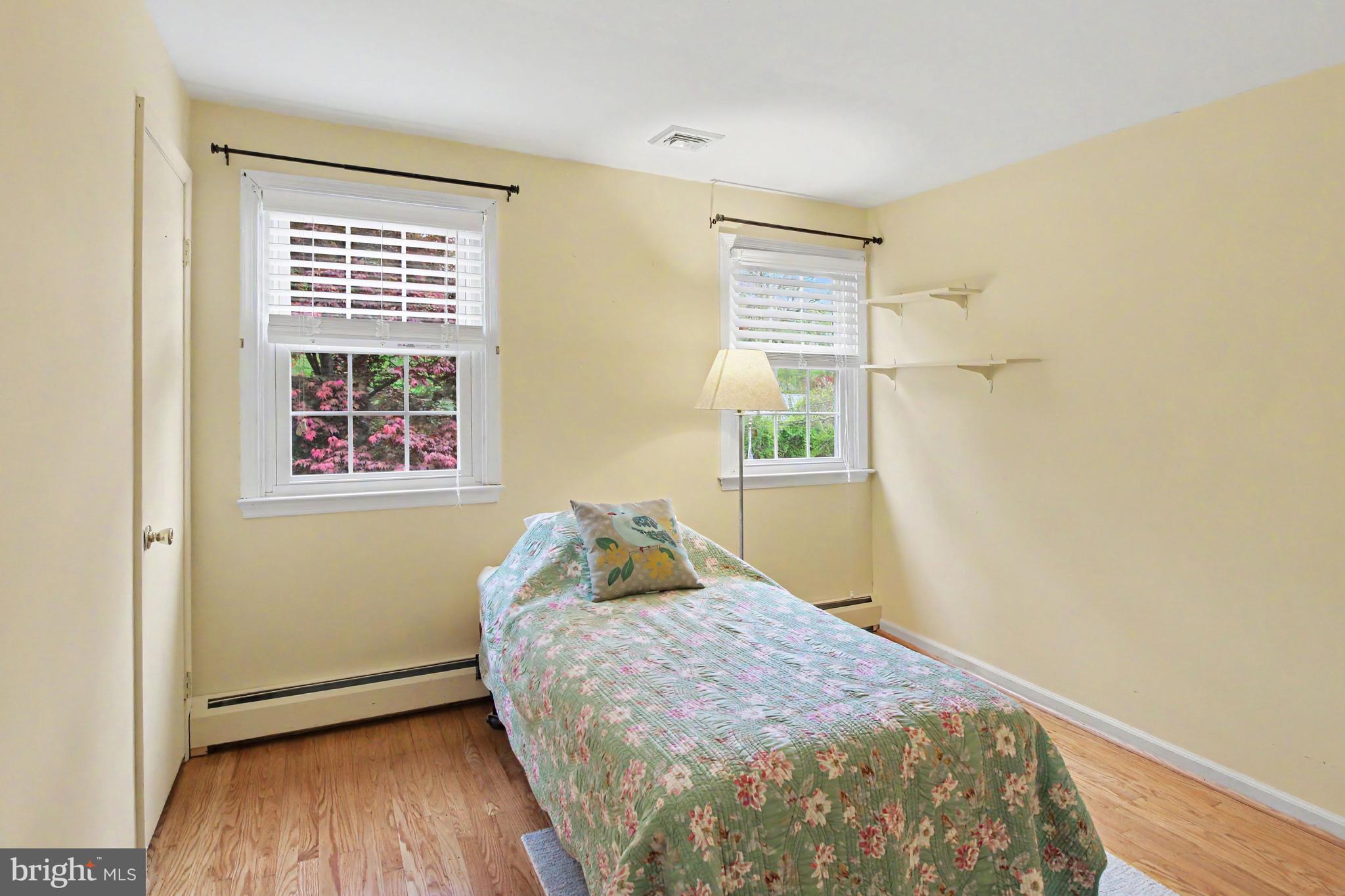 917 Cedar Grove Road Broomall, PA 19008 - Photo 18 of 33 a bedroom with a bed and a window