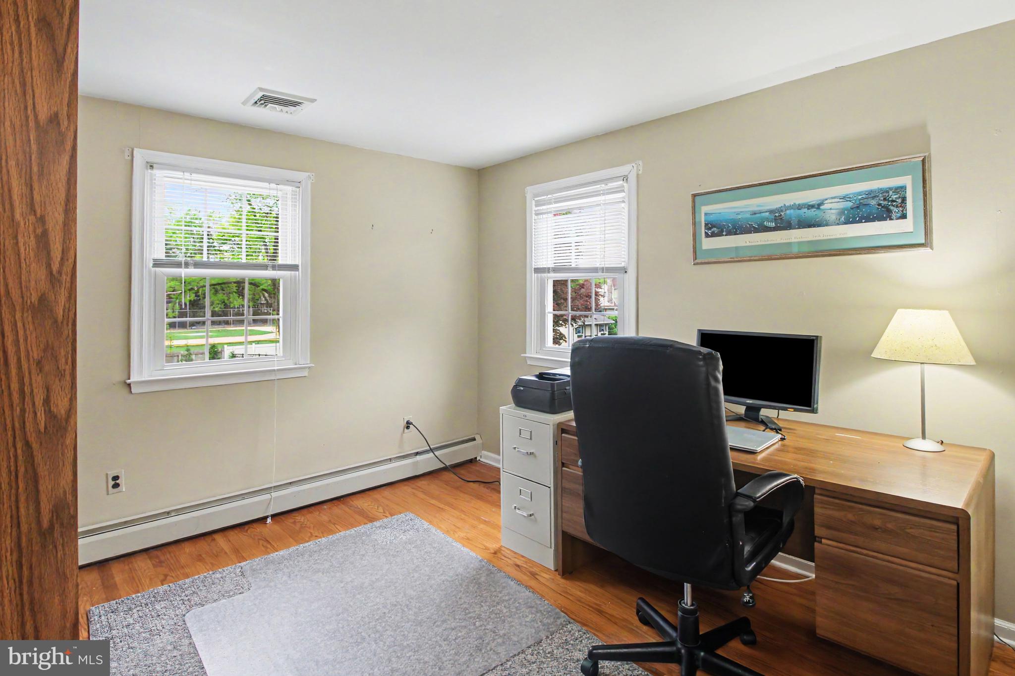 917 Cedar Grove Road Broomall, PA 19008 - Photo 19 of 33 a view of a workspace with furniture and a window