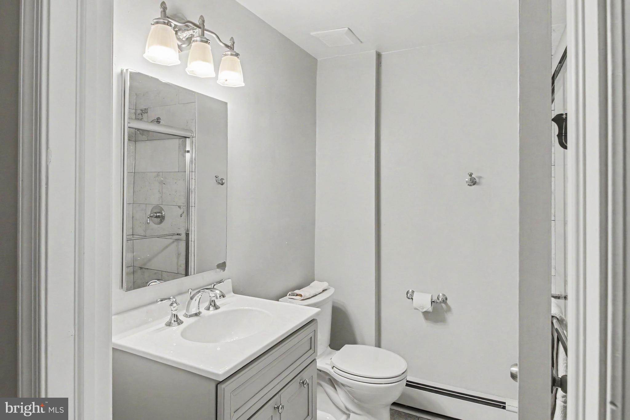 917 Cedar Grove Road Broomall, PA 19008 - Photo 21 of 33 a bathroom with a sink toilet and shower