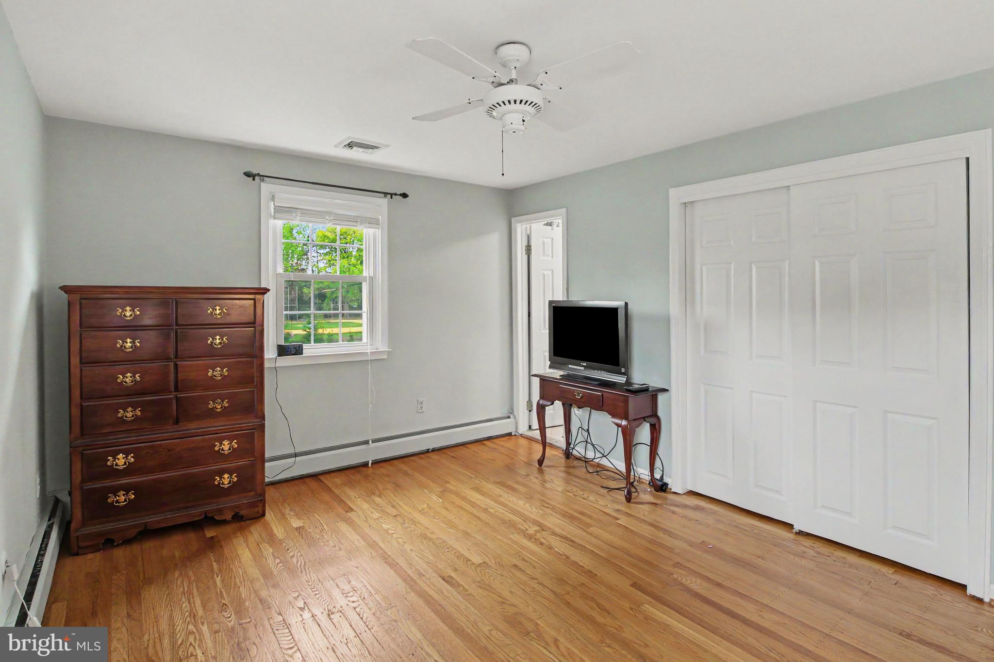 917 Cedar Grove Road Broomall, PA 19008 - Photo 23 of 33 a living room with furniture and a flat screen tv