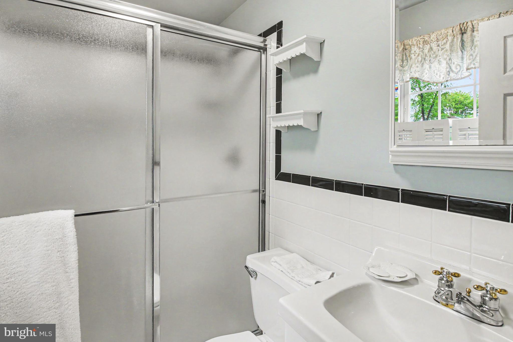 917 Cedar Grove Road Broomall, PA 19008 - Photo 24 of 33 a bathroom with a sink toilet and shower