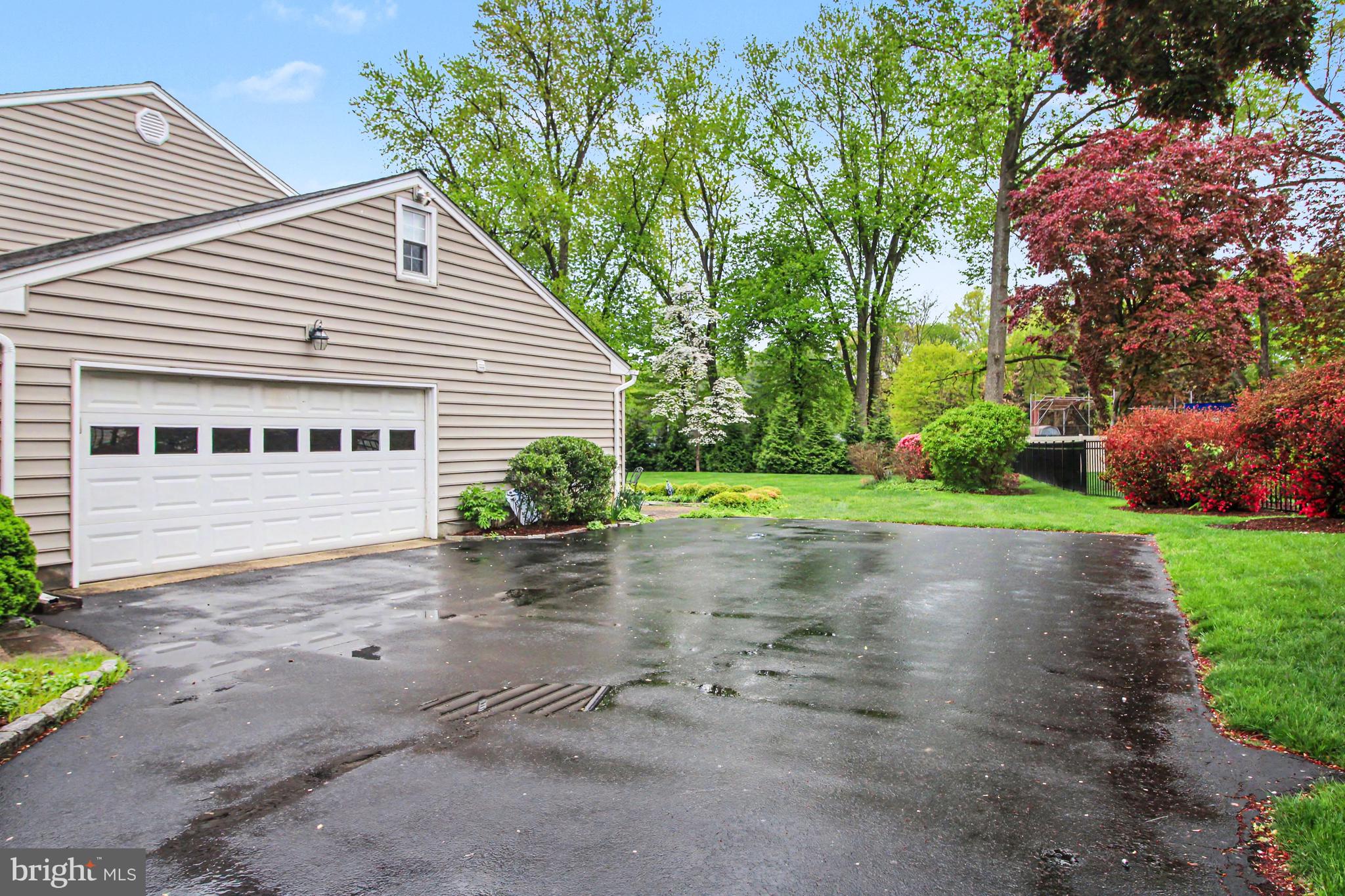 917 Cedar Grove Road Broomall, PA 19008 - Photo 28 of 33 a view of a house with a small yard and a large tree