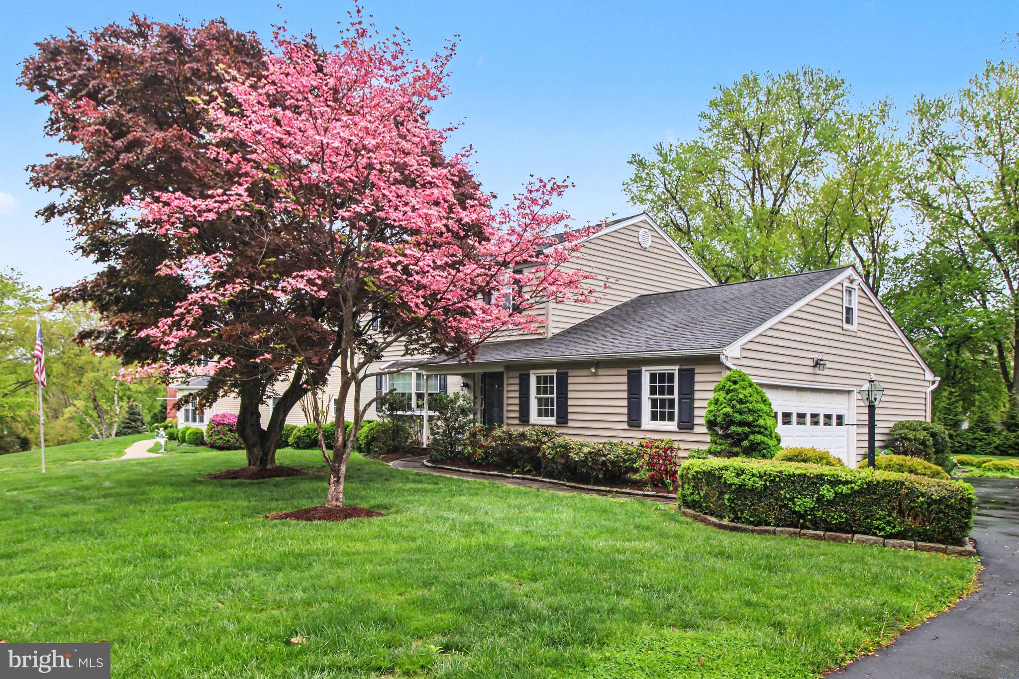 917 Cedar Grove Road Broomall, PA 19008 - Photo 3 of 33 a front view of a house with a garden