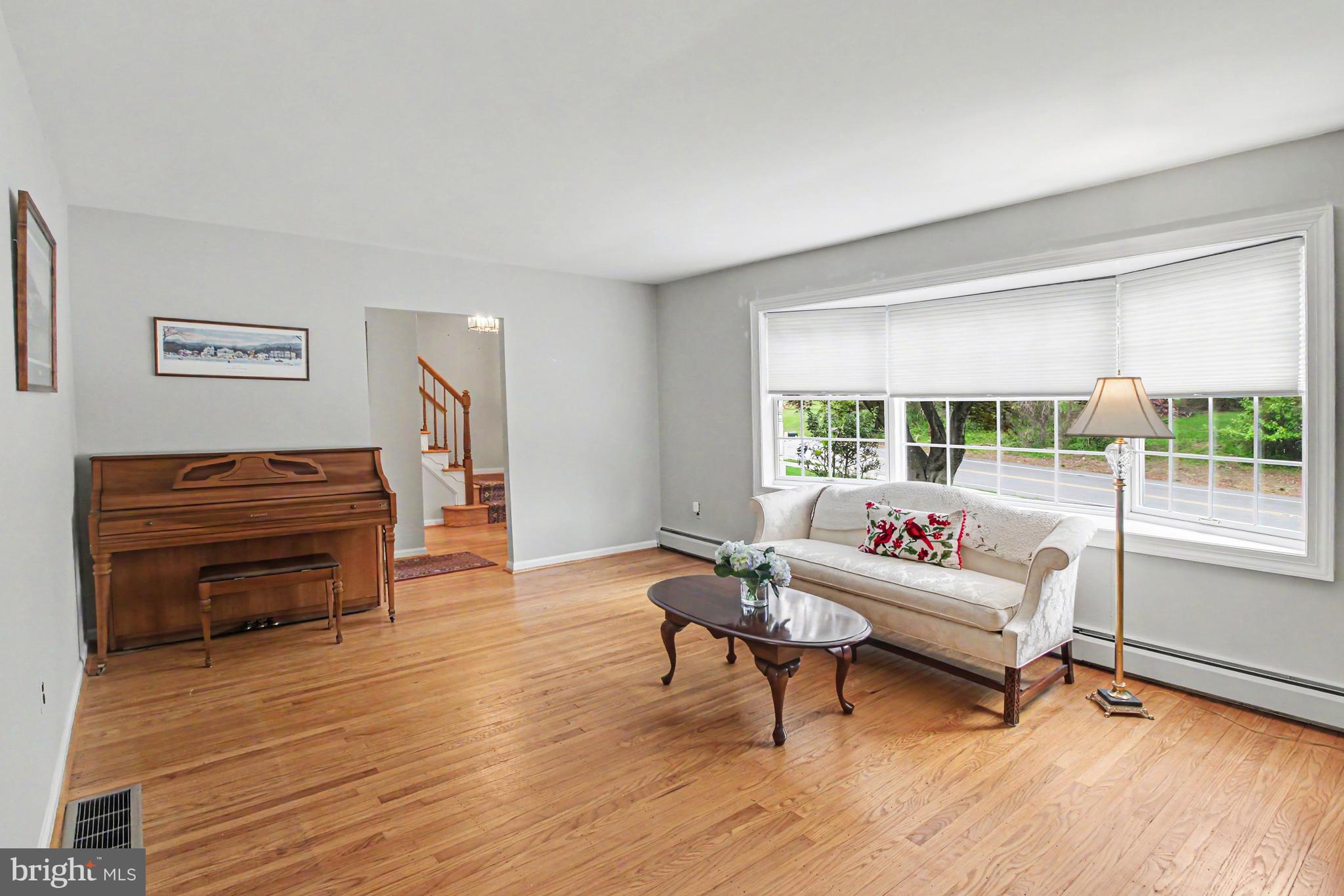 917 Cedar Grove Road Broomall, PA 19008 - Photo 6 of 33 a living room with furniture and a wooden floor